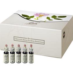 Fünf kleine Fläschchen stehen vor einer großen weißen Box.